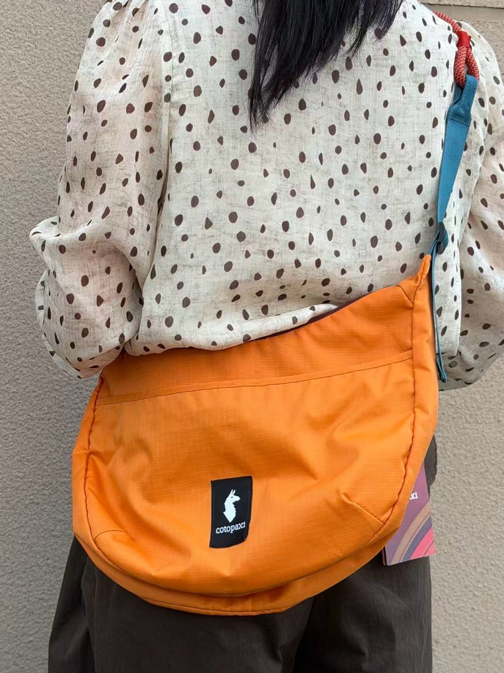 cotopaxi Orange Crescent Sling Crossbody Bag with Teal Strap